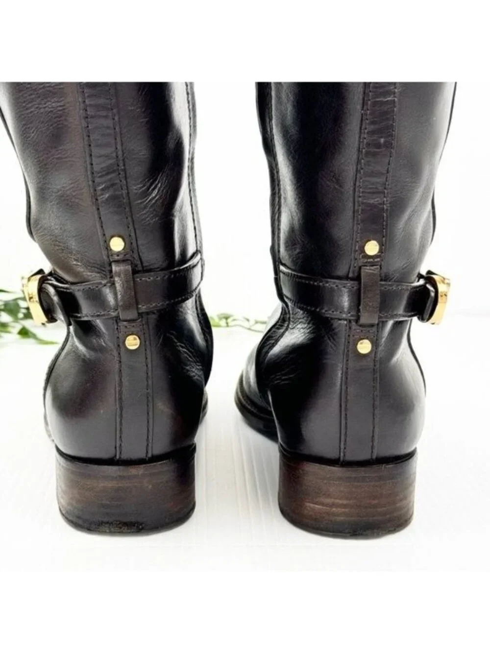 Tory Burch holds size holes
